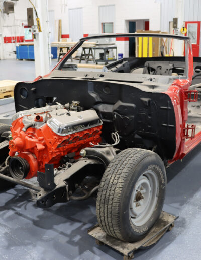 Car being restored in the shop