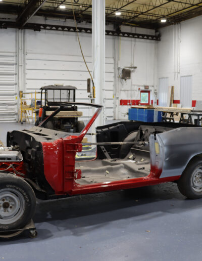 Car being restored in the shop