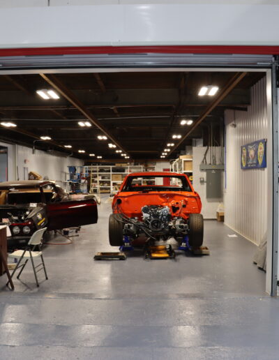 cars being worked on in shop